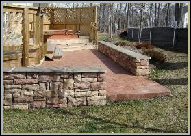 Stamped Random Stone Patio with Stone Walls