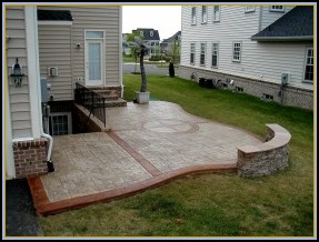 Ashler Stamped Concrete Patio with Compass Artwork