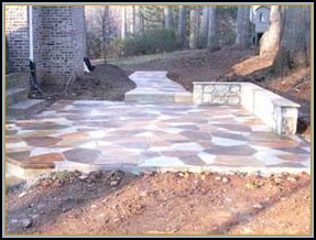 Stamped Flagstone Patio with Acid Staining and Wall